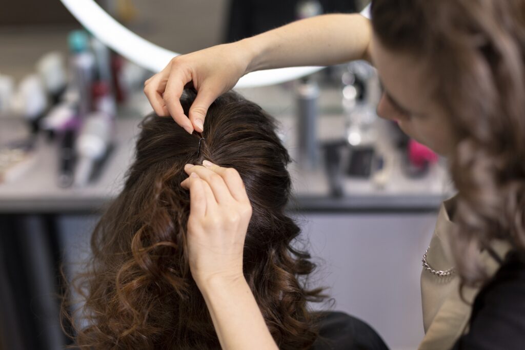 hairdresser taking care her client